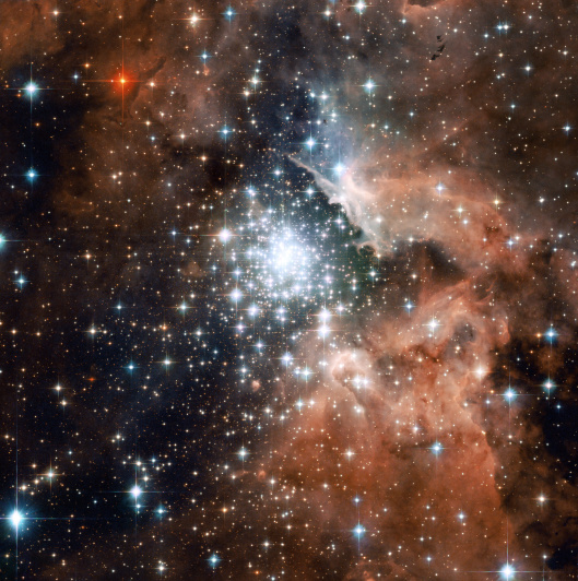Extreme star cluster bursts into life in new Hubble image